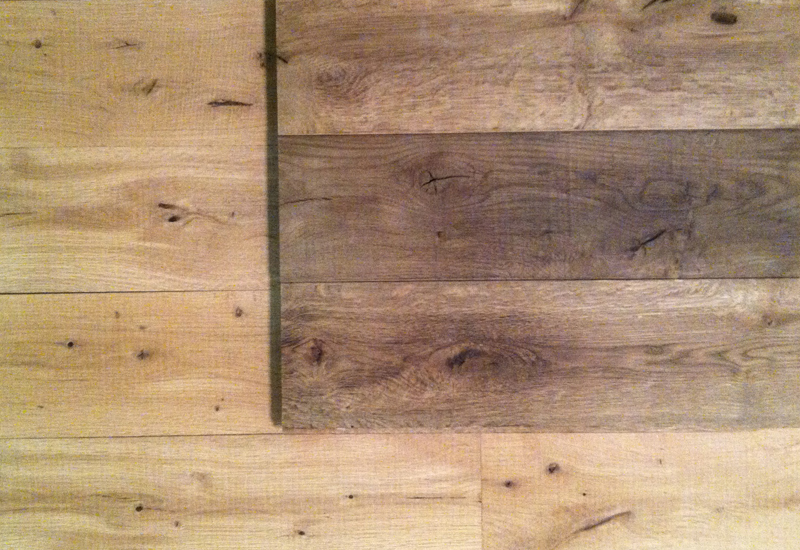 Aged and weathered post oak planks on top of natural unfinished post oak